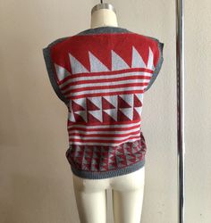 Rad 80s geometric sweater shirt/vest, maroon and gray colors. No tags but fits like a women's size small/medium. Shown here on a size 4 mannequin. Use measurements below for reference. A small discoloration spot (unnoticeable) shown in last photo. Measurements laying flat: 18.5 inches pit y 20.5 inches collar to hem Thanks for looking :) Womens Sweater Vests, Geometric Sweater, Sweater Vests, Shirt Vest, Sweater Vest Women, Womens Sweater, Vest Shirt, Peplum Top, Sweaters For Women