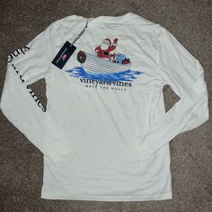 Vineyard Vines White Long Sleeve Christmas Holiday Shirt In A Size Xs (Mens), Will Fit A Women’s Small Approximately. Deck The Hulls Print. Brand New With Tags! Casual Long Sleeve Holiday Tops, Casual Long Sleeve Tops For Holiday, Casual Cotton Tops For Holiday, Fitted Long Sleeve Tops For Holiday, Cotton Long Sleeve Holiday Top, Long Sleeve Cotton Top For Holiday, Cotton Long Sleeve Top For Holidays, Holiday Long Sleeve Cotton Top, Casual White Top For Christmas