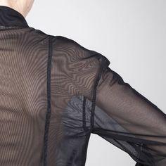 TECHNOCRACYBlack tulle dropped shoulder blouse w/ concealed press button fastening. 100% polyesterModel wears size SFront length: 68cmBack length (excl. collar): 74cmSleeve length: 49cmCuff: 7cmShoulder: 18,5cm Sheer Polyamide Tops For Spring, Fitted Mesh Blouse For Fall, Sheer Polyamide Party Top, Sheer Polyamide Tops For Party, Sheer Polyamide Top For Party, Chic Sheer Polyamide Tops, Elegant Black Polyamide Tops, Elegant Tops With Mesh Sleeves, Polyamide Long Sleeve Party Tops