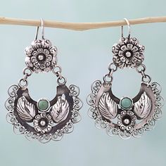 According to the Mazahua Family each piece of their jewelry is crafted by hand and all are reflections of our region's customs inspired by nature with traditional motifs like birds flowers and leaves. This pair of dangle earrings does that statement justice featuring two stones of natural turquoise surrounded by sterling silver floral filigree motifs. Mexican Folk Art Decor, Pottery Templates, Boho Festival Outfit, Skull Spider, Folk Art Decor, Mexican Earrings, Boho Items, Engagement Earrings, Silver Flower Earrings