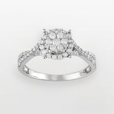 This diamond frame ring is a truly captivating choice.This Lovemark diamond frame ring is a truly captivating choice.Ring Details: Width: .33-in. Metal: 10k white gold Diamond Details: Carat total weight: 1/2 Cut: round Color: G-H-I Clarity: I2-I3 Setting: pave Image(s) may be enlarged to show detail. Diamond weights are approximate. Diamond total weights may vary between .01 and .08 ct. Some diamonds have fewer than 17 facets. Please note, due to the high value of this item, a signature may be Platinum Diamond Ring With Halo Design And Cluster Shape, Halo Diamond Ring For Anniversary, Diamond Promise Ring With Halo Setting, Diamond White Cluster Ring With Halo Design For Anniversary, Diamond White Cluster Diamond Ring With Halo Design, White Cluster Diamond Ring With Halo Design, 14k White Gold Diamond Ring For Proposal, Diamond White Cluster Diamond Promise Ring, Diamond White Diamond Ring For Promise