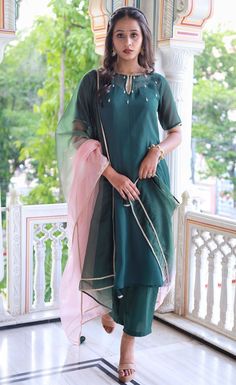 "Introducing our exquisite :- Embrace the beauty of imperfections with our \"Midnight Bloom Georgette Kurta Plazzo Set\"🌺 Crafted from a combination of georgette, cotton, and organza fabrics, this set showcases a captivating bottle green color that exudes elegance and charm. The keyhole neckline adds a touch of allure to the kurta, making it a fashionable choice for any occasion. The set includes a chic kurta, comfortable plazzo pants, inner lining, and a graceful dupatta, ensuring a complete a Festive Semi-stitched Straight Kurta Salwar Kameez, Unstitched Straight Kurta Palazzo Set With Gota Work, Eid Straight Kurta Set With Gota Work, Eid Gota Work Straight Kurta Set, Designer Wear Sets With Gota Work, Designer Wear Straight Kurta Set With Gota Work, Semi-stitched Dabka Pant Set For Wedding, Designer Straight Kurta Palazzo Set With Dabka Work, Designer Wear Palazzo Set With Dabka For Eid