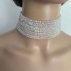 Shine bright like a diamond! Are you looking for a perfect choker? Stop here, I made it for you! Can't explain in words how obsessed I am with this crystals choker. I couldn't even catch in the photos the shine, exquisiteness and glamorousness of this necklace! I think is just perfect! I made it using 4mm shiny crystal beads and gold plated or platinum plated brass clasp.  Width: 4.5cm/1.7 inches  Dimensions:  Available lengths  - 13 inches - 13.5 inches  - 14 inches - 14.5 inches  - 15 inches - Elegant Multi-strand Crystal Necklaces For Parties, Adjustable Bling Choker Necklace, Elegant Multi-strand Crystal Necklace For Parties, Adjustable Dazzling Crystal Necklaces, Party Crystal Necklaces, Party Crystal Necklaces With Sparkling Stones, Glamorous Crystal Choker Necklaces For Gifts, Round Crystal Necklaces With Sparkling Stones For Party, White Crystal Choker Jewelry