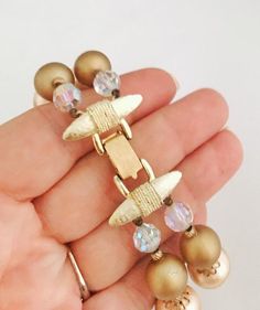 Vintage Vendôme mid century bracelet. Light gold tone, lucite and Aurora borealis Swarovski crystal Edgy Gifts, Vintage Beaded Bracelet, 1950s Bracelet, Cameo Earrings, Swarovski Crystal Beads, Light Peach, Aurora Borealis, Gift For Women, Swarovski Crystal