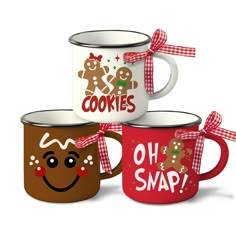 three coffee mugs decorated with gingerbread cookies