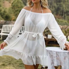 Step into summer with elegance and style with our Chic Net Yarn Tassel Beach Dress Cover-Up. Perfect for the fashion-forward woman, this cover-up combines comfort, style, and functionality, making it an essential for any beach day or poolside relaxation. Key Features Material: Crafted from high-quality acrylic, ensuring a lightweight and breathable feel. Pattern: Elegant solid design that offers a chic and timeless look. Style: Designed in an 'Office Lady' elegant fashion style, this cover-up is Beachy Mini Length Cover-up For Beach Party, Chic Tunic Cover-up For Beach Season, Chic Mini Length Cover-up For Vacation, Spring Beach Cover-up Dress With Tassels, Spring Summer Dress With Back Tassel Tie-up, Beachy Mini Sundress For Beach Cover-up, Summer Mini Dress For Poolside, Beachwear Cover-up For Summer Outings, Beachwear Cover-up For Summer Beach Season