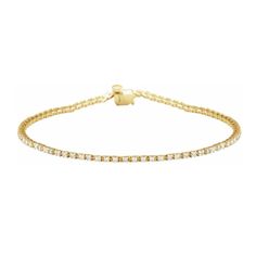 Bracelets are meant to have the last word that compliments every look you create. You are beautiful, and so is your arm candy. 14K yellow gold, conflict-free, lab-grown diamond, and sure to swoon. HOW WE STYLE OUR BRACELETS The world is at your wrist when styling our signature bracelets. They stack well with others, so don’t be shy! Add bangles, charms, and chains for a statement that will turn heads. For a minimal approach, we’re all about solo-wear. Nothing but good choices here. 7 - 1/4" in l Dainty Yellow Gold Tennis Bracelet With Diamond Accents, Classic Yellow Gold Tennis Bracelet For Everyday, Classic Everyday Yellow Gold Tennis Bracelet, Everyday Yellow Gold Tennis Bracelet With Diamond Accents, Everyday Yellow Gold Bracelets With Prong Setting, Classic Adjustable Yellow Gold Tennis Bracelet, Minimalist Gold Tennis Bracelet With Single Cut Diamonds, Adjustable Vvs Clarity Yellow Gold Tennis Bracelet, Everyday Gold Bracelets With Brilliant Cut