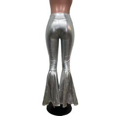 "**Due to SO MANY issues with USPS - we STRONGLY ENCOURAGE you to purchase the UPS Upgrade with your order located here: https://www.etsy.com/listing/926751536/ups-upgrade Made of shiny silver metallic spandex - these high-waisted bell bottoms will fit you perfectly. They hug your hips and flare out at the feet. The standard inseam is 34\" (the mannequin is 5'8\") but can be customized by putting your desired inseam in the comments/notes when checking out. Women's Sizing (See below for instructi High Waist Pants For Spring Concerts, Retro Bottoms For Night Out In Spring, Retro Bottoms For Spring Night Out, Metallic Disco Bottoms For Spring, Retro Spring Bottoms For Night Out, Stretch High Waist Pants For Concert, High Waist Stretch Pants For Concert, Fitted Retro Bottoms For Night Out, Retro Fitted Bottoms For Night Out