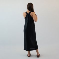 "This minimalist, clean-line look midi linen dress is perfectly tailored to your body for an ultra-elegant look in your style. Complete your style with our LINEN SHIRT or KID MOHAIR CARDIGAN. See our CAPSULA COLLECTIONS section: https://www.etsy.com/shop/zzlinen?ref=seller-platform-mcnav&section_id=42301024 This garment is made of finest quality stone washed linen, 100% linen with OEKO-TEX certificate. Perfect for various stylings and occasions, you will feel light and relaxed anywhere you go! D Fitted Minimalist Midi Dress, Black Linen Summer Dress For Daywear, Modern Black Maxi Dress For Work, Solid Midi-length Linen Dress For Beach, Solid Midi Length Linen Dress For Beach, Midi-length Linen Dress For Beach, Chic Black Linen Beach Dress, Chic Black Linen Dress For The Beach, Elegant Linen Dress For Beach