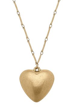 Add a touch of delicate beauty to your outfit with the Eden Puffy Heart Necklace in Worn Gold. Its vintage charm makes it a versatile and timeless piece. Perfect for everyday wear or special occasions. Vintage Everyday Heart Pendant Jewelry, Elegant Brass Heart Necklace, Elegant Heart-shaped Brass Necklace, Heart Shaped Brass Necklaces, Dainty Heart-shaped Brass Necklaces, Everyday Vintage Jewelry For Valentine's Day, Vintage Everyday Jewelry For Valentine's Day, Brass Heart Necklace With Heart Charm Pendant, Brass Heart Necklace With Heart Charm