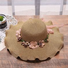 Category:Hats,Cap; Season:Summer,Spring; Gender:Women's; Quantity:1PC; Style:Fashion,Active; Hats Category:Sun Hat; Occasion:Beach,Outdoor,Holiday; Material:Straw; Color:Khaki,Beige; Function:Sun Protection,Portable; Pattern:Pure Color; Design:Flower; Front page:FF; Listing Date:04/18/2024; Head Circumference:57 Handmade Brown Sun Hat For The Beach, Active Hats, Beige Bohemian Sun Hat For Beach Season, Bohemian Yellow Brimmed Sun Hat, Bohemian Hats For Beach Season, One Size, Adjustable Flower-shaped Sun Hat For Vacation, Beach Flowers, Holiday Beach, Outdoor Holidays