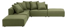 a green sectional couch with pillows on the top and bottom, sitting in front of a white background