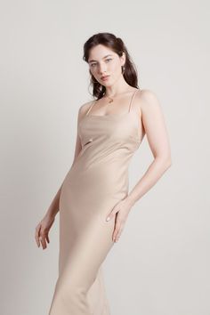 Transform your look with lovely dresses for spring wedding guest. Get read to shine in this Sand Satin Slip Midi Dress new arrival. Shop this new spring dress from TOBI. Light Blue Satin Dress, Holiday Formal Dresses, Beige Midi Dress, Simple Street Style, Blue Satin Dress, Slip Midi Dress, Spring Wedding Guest, Elegant Bridesmaid Dresses, Light Chain