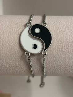 These unique friendship or couples matching bracelets are the perfect gift for your best friend or significant other! Yin and Yang. / (jɪn) / noun. two complementary principles of Chinese philosophy: Yin is negative, dark, and feminine, Yang positive, bright, and masculine. Their interaction is thought to maintain the harmony of the universe and to influence everything within it. Matching Gifts For Friends, Casual Adjustable Chain Jewelry For Friendship, Minimalist Silver Resizable Friendship Bracelet, Silver Friendship Bracelets With Adjustable Chain, Nickel-free Silver Friendship Bracelet, Silver Spiritual Friendship Bracelets, Minimalist Silver Friendship Bracelets, Minimalist Hypoallergenic Silver Friendship Bracelets, Trendy Silver Friendship Bracelets