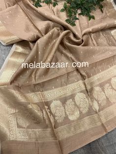 Soft pure silk moonga dupatta with Banarsi weaving. Wedding Beige Dupatta In Slub Silk, Wedding Beige Slub Silk Dupatta, Eid Blouse Piece With Dupatta In Slub Silk, Elegant Slub Silk Dupatta, Gold Slub Silk Dupatta For Transitional Season, Transitional Gold Slub Silk Dupatta, Festive Beige Slub Silk Dupatta, Transitional Beige Dupatta With Cutdana, Celebration Sheer Slub Silk Dupatta