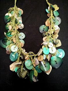 a necklace with many different buttons on it