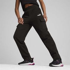 The PUMA Women's Mid Rise Straight Cargo Fleece Pant combines comfort, utility, and a relaxed, sporty look. Made from soft fleece fabric, these pants offer warmth and a cozy fit, making them perfect for lounging, outdoor activities, or casual wear. The mid-rise waistband provides a secure and comfortable fit, while the straight-leg design gives a flattering, relaxed silhouette. Featuring functional cargo pockets on the sides, these pants offer ample storage space for essentials. The subtle PUMA Sports Parachute Pants With Pockets And Straight Leg, Straight Leg Parachute Pants For Sports, Sports Wide Leg Pants With Cargo Pockets, Sporty Straight Leg Parachute Pants With Hip Pockets, Sporty Straight Leg Parachute Pants, Full Length Cotton Cargo Pants For Sports, Sports Bottoms With Cargo Pockets And Wide Leg, Sporty Tapered Leg Cargo Pants With Hip Pockets, Sports Cargo Pants With Side Pockets And Wide Leg