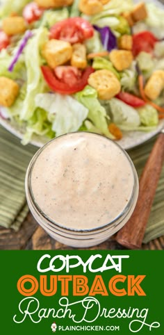 a salad with dressing in a glass bowl