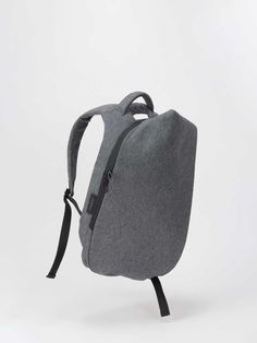 Conceived for those who want a bag that combines a futuristic design statement with practicality and comfort, our scaled down version of the Isar is not only laptop friendly, but boasts the same comfortable straps and specialist finishes as its larger siblings. The body of the rucksack is made from a black EcoYarn - a durable fabric developed through sustainable processes, complimented by a discreet black interior and black metallic trims. The small Isar EcoYarn rucksack has a zipped front pocke Design Statement, Futuristic Design, Laptop Pocket, Black Metallic, Black Interior, New Product, Gray Color, Water Resistant, Laptop