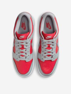 The 80s icon returns with classic details and a basketball style: the Dunk Low "Ultraman" brings vintage style back to the streets. The leather upper softens and gains retro character with wear, and the foam midsole offers lightweight, responsive cushioning.
  Leather upper
 Lace-up closure
 Rubber outsole


Size & Fit:
Fit regular Red Urban Running Sneakers, Urban Red Running Sneakers, Casual University Red Running Shoes For Streetwear, University Red Cushioned Running Shoes For Streetwear, Red Low-top Sportswear Sneakers, University Red Casual Basketball Shoes With Air Max Cushioning, Casual University Red Basketball Shoes With Air Max Cushioning, Red Sneakers For Streetwear, Boot Pumps