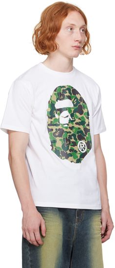 Cotton jersey T-shirt. · Rib knit crewneck · Logo graphic printed at front and back · Logo flag at cuff Supplier color: White X green Knit Crewneck, Logo Graphic, Jersey T Shirt, Rib Knit, Camo, Abc, Color White, Flag, Top Brands