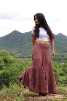 All items are shipped to Thailand Post . Free upgrade to D.H.L Express when you buy 2 or more items . The USA only. US sizing fits XS - XL please check the sizes in inches in the description. From Twist and Crinkle Collection Due to popular demand I have now made this style of skirt in double fabric for winter wear . This lovely Boho piece is made from 100% cotton. The skirt is in 4 tiers. A great piece to wear with a tight or cropped top .You can even wear it as a strapless dress by pulling it Bohemian Non-stretch Midi Skirt, Bohemian Relaxed Skirt, Summer Brown Ruffled Maxi Skirt, Bohemian Long Relaxed Skirt, Bohemian Long Wrap Skirt With Lining, Bohemian Midi Skirt For Vacation, Bohemian Flared Maxi Skirt With Lining, Bohemian Midi Skirt For Festivals, Summer Tiered Brown Maxi Skirt