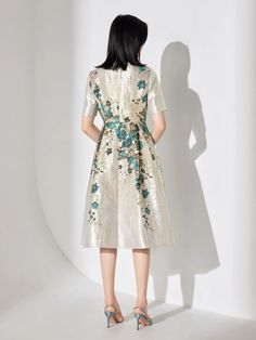 Discover the effortless elegance of our Elegant Floral Women’s Midi Dress, designed by Guocali . This stunning women’s dress features a vibrant floral pattern that exudes femininity and grace. Ideal for any occasion, it ensures you make a lasting impression with its timeless beauty. Key Features: Floral Pattern: Adds a touch of elegance and charm. V-Neck Design: Offers a flattering, stylish look. Short Sleeves: Perfect for warm weather and casual comfort. Slip-On Style: Easy to wear and ideal for any occasion. Crafted from high-quality polyester, this fashion dress combines comfort and style effortlessly. The A-line silhouette and midi length create a graceful flow, making it suitable for casual outings or special events. Whether you're dressing up for a gathering or embracing a relaxed su Cream A-line Midi Dress With Floral Print, Elegant Midi Dress With Floral Print, Elegant Mid-length Floral Print Dress, Elegant Floral Print A-line Dress, Elegant A-line Dress With Floral Print, Elegant Short Sleeve Floral Dress For Garden Party, Floral Print A-line Dress For Wedding, A-line Cream Midi Dress With Floral Print, Elegant Beige Floral Print Dress