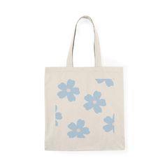 a bag with blue flowers on the front and back, sitting against a white background