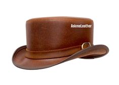 Leather Top Hat Buckle Leather Band Style - Brown Top Hat Handmade with 100% Cowhide Leather Gift for him New with Tags Description: * High-Quality Craftsmanship handmade * Real Leather * 100% pure leather **Those living in remote areas will have to pay $45 extra as shipping charges before the item is shipped. Sizing: Heads come in all sizes, and in a lots variety of shapes. Although high quality hats are adaptable, and will usually conform to differences in shape with a little wearing, it is essential that the size be correct for the head. To determine your hat size, measure the circumference around your head, keeping the tape level and firm, across the temples and above the eyebrow ridges. Check the size chart given below. For in-between measurements use the next size up. Hat Care: Any s Vintage Leather Hat With Flat Bill, Vintage Leather Flat Bill Hat, Brown High Crown Top Hat For Rodeo, Brown Leather Top Hat For Rodeo, Brown Leather Top Hat With Curved Brim, Vintage Leather Hat With High Crown, Steampunk Leather Brimmed Hat Bands, Vintage Leather High Crown Hat, Vintage High Crown Leather Hat