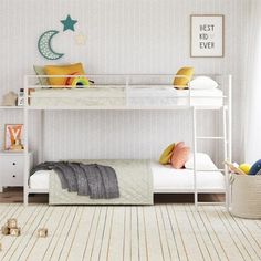 a white bunk bed sitting in a bedroom next to a wall with stars on it