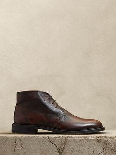 Formal Lace-up Boots With Leather Lining, Semi-formal Fall Chukka Boots With Round Toe, Formal Fall Boots With Stitched Sole, Formal Boots With Stitched Sole For Fall, Classic Formal Lace-up Boots For Fall, Formal Calf Leather Lace-up Boots, Formal Fall Lace-up Chukka Boots, Formal Lace-up Chukka Boots For Fall, Formal Lace-up Boots With Plain Toe For Fall