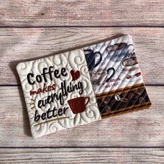 two coasters that have coffee mugs on them and the words coffee makes everything better