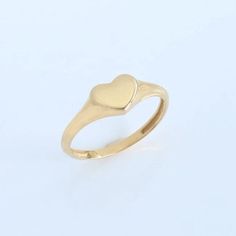 "Happy Women's Day! Gold Signet Heart Ring available in 10K, 14K, 18K - Yellow Gold, White Gold, Rose Gold. Simple, yet sophisticated, it could be perfect to fit your daily modern look. The perfect personalizable ring that is special to you. This valentine give a loving gift that will make her heart melt! ----------------------------------------- Cleaning and Care: Use Soft Cotton Cloth to clean the piece. ------------------------------------------- Why you'll love it Every piece is handmade wit Hallmarked Heart-shaped Diamond Ring, Oval Heart Promise Ring For Valentine's Day, Oval Heart Ring For Valentine's Day Promise, Classic Heart-shaped Signet Ring For Wedding, Classic Oval Heart Ring For Valentine's Day, Classic Heart Cut Signet Ring For Promise, Heart Shaped Signet Ring For Valentine's Day, Heart-shaped Signet Ring For Valentine's Day, Valentine's Day Heart Shaped Signet Ring In Fine Jewelry