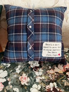 there is a pillow with a message on it