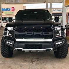 the front end of a black pickup truck