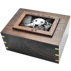 a wooden box with a photo in it