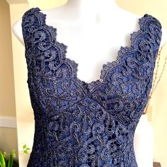 Adrianna Papell Occasions Embroidered Metallic Lace Navy Blue V-Neck Sleeveless Dress-6p Very Elegant, Beautiful New Without Tags Navy Blue Metallic Lace Sheath Dress. - Metallic Lace Design - Fully Lined - V-Plunge Neckline - Scalloped Edges - Hidden Zipper W/Hook & Eye Closure - Sleeveless This Beauty Is Stunning. Wear As A Party Dress/Mother-Of-The Bride Dress/ Evening Dress/ Special Occasion Dress/, Etc. Exquisite Quality, Timeless Style. Elegant Sleeveless Blue Mother Of The Bride Dress, Fitted Blue V-neck Mother Of The Bride Dress, Blue V-neck Mother Of The Bride Dress For Party, Blue V-neck Mother Of The Bride Dress For Evening, Blue V-neck Mother Of The Bride Evening Dress, Paisley Print V-neck Party Dress, Blue Paisley Print V-neck Dress, Special Occasion Dress, Adrianna Papell Dresses