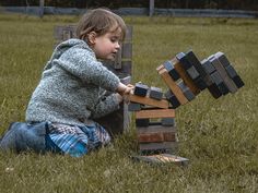 "Looking for a fun and engaging game to play with friends and family? Look no further than our handcrafted wooden Tumbling Tower Game! Made from alder wood, this game is built to last and is perfect for indoor and outdoor play. Also known as the block tower game, our Tumbling Tower Game is a great way to bring people together and have a blast! Whether you call it the tricky tower, toppling tower, or wobble tower, this game is sure to provide hours of entertainment for all ages. Best for 2-10 players.  To play, stack the wooden blocks in a tower formation, with each layer consisting of three blocks placed perpendicular to the previous layer. The tower should have 18 layers in total. Players then take turns carefully removing one block at a time from the tower and placing it on top. The goal Tower Falling, Tower Games, Play With Friends, Tower Stand, Family Look, Alder Wood, Family Entertainment, Classic Games, Wooden Blocks