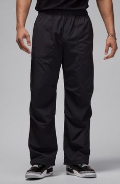 Roomy and relaxed, these all-activity pants made of lightweight nylon sport a trio of handy pockets and a go-anywhere-do-anything vibe. Elastic waist Front slant pockets; back welt pocket 100% nylon Machine wash, line dry Imported Nylon Sports Bottoms With Pockets, Waterproof Nylon Athleisure Bottoms, Sports Nylon Cargo Pants With Elastic Waistband, Sports Cargo Pants With Elastic Waistband, Functional Black Nylon Cargo Pants, Black Nylon Functional Cargo Pants, Nylon Cargo Pants With Elastic Waistband For Sports, Black Nylon Activewear With Pockets, Go-dry Nylon Bottoms For Streetwear