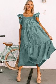 Green Smocked Neckline Flutter Sleeve Maxi Dress Summer Dresses With Ruffles In Relaxed Fit, Flowy Tiered Casual Midi Dress, Flowy Tiered Midi Dress Casual, Flowy Tiered Midi Dress Casual Style, Summer Billowy Ruched Dresses, Relaxed Fit Ruffle Dress For Day Out, Relaxed Fit Ruffled Dress For Day Out, Billowy Ruched Summer Dresses, Relaxed Fit Dress With Ruffles For Day Out