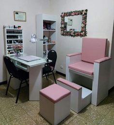 a salon with pink and white furniture