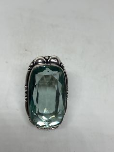 Large brilliant aqua antique glass Ornate German Silver Vintage ring, does not tarnish Size 7.25 My jeweler will re size for a $10-$20 fee All rings are shipped in a nice gift box. Check out our over a THOUSAND great reviews Engraving is $4 per letter and is not always perfect depending on the piece. It can take a few days if the jeweler is busy. This is payable to Paypal Judithsltd@gmail.com Vintage Green Crystal Ring Gift, Vintage Green Crystal Ring For Gift, Green Vintage Crystal Ring Gift, Vintage Aquamarine Ring Jewelry, Vintage Silver Crystal Ring With Large Stone, Vintage Aquamarine Jewelry For Gift, Vintage Aquamarine Silver Rings, Vintage Aquamarine Topaz Ring Gift, Knuckle Rings