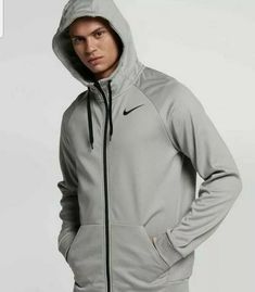 NIKE THERMA DRY FULL ZIP HOODIE AJ4450-091 SZ XLT 32 Inches from top of shoulder to bottom 26 Inches from arm pit to arm pit Urban Hooded Activewear For Sports, Nike Moisture-wicking Hoodie Activewear, Nike Fleece Track Jacket For Sports, Nike Sports Hoodie Activewear, Nike Moisture-wicking Athleisure Hoodie, Gray Fleece Sweatshirt For Workout, Gray Fleece Sweatshirt For The Gym, Nike Hoodie With Adjustable Hood For Gym, Nike Sportswear Hooded Jacket For Sports Season