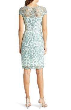 An elegant sheath exquisitely fashioned from ornate lace asparkle in tonal sequins is perfect for weddings, cocktail parties and date nights. 40" length (size 8) Hidden back-zip closure Bateau neck Cap sleeves Partially lined 60% polyester, 40% nylon with 60% cotton, 40% nylon contrast Dry clean Imported Special Occasion Spring Sequin Lace Dress Embellished, Glamorous Lace Sequin Dress For Spring, Elegant Lace Evening Dress For Spring, Glamorous Spring Lace Sequin Dress, Lace Mother Of The Bride Dress For Gala, Glamorous Lace Summer Evening Dress, Elegant Spring Evening Dress With Lace Bodice, Spring Lace Evening Dress With Scalloped Lace, Summer Lace Evening Dress For Formal Events