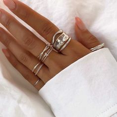 This wave stacking band ring features an eye-catching sculptural design with adjustable sizing for the perfect fit. Sterling Silver Band Width 0.15in(4mm) Adjustable Size 5-7 #R124-S Silver Ring Stack, Gold And Silver Ring, Rings Stack, Minimalist Silver Ring, Nails Rings, Ring Stacks, Double Band Rings, Stackable Rings Silver, Opal Band