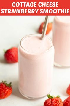 two glasses filled with strawberry cheese smoothie next to strawberries