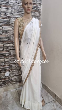 This is designer party wear saree embellished with mirror work. Blouse is made in silk fabric embellished with mirror work. Saree is made in georgette fabric embellished with mirror work all over.  Stitching  For stitched dresses you can chose from size chart or can message us for customization.our team will send you size chart for customization. Feel free to convo for any details to help you in your selection because customize dresses cannot be return or exchange.  Note: color may slightly vary Embellished Chanderi Pre-draped Saree, Wedding Embellished Pre-draped Saree In Chinon, Navratri Embellished Chanderi Pre-draped Saree, Designer Embellished Pre-draped Chanderi Saree, Traditional Saree With Mirror Work For Reception, Reception Gota Work Pre-draped Saree, Embellished Chanderi Saree For Navratri, Art Silk Pre-draped Saree With Gota Work For Reception, Embellished Semi-stitched Chanderi Pre-draped Saree