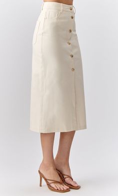 Elegant Knee-length Bottoms With Button Closure, Spring Midi Bottoms With Button Closure, Classic Midi-length Relaxed Skirt, Elegant Midi Skirt With Button Closure, Beige Buttoned Long Skirt, Beige Long Skirt With Buttons, Casual Midi Bottoms With Button Closure For Day Out, Casual Midi Skirt With Button Closure For Day Out, Workwear Bottoms With Button Closure And Midi Length