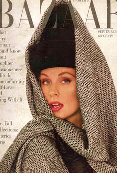 a magazine cover with a woman wearing a black hat and scarf on it's head