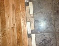 a bathroom with wood floors and tile on the floor